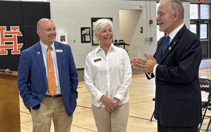 State School Superintendent Richard Woods (far right) speaks with (L-R) Associate Superintendent Brooks Mewborn and Hart County Board of Education member Henly Cleary following a ceremony honoring students, teachers and administrators from Hartwell Elementary School and Hart County Middle School (HCMS) at HCMS Monday morning. (Photo/Adriana Cascio