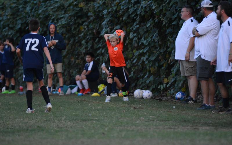 Rhett Simpson throws the ball into play during a home match in September of 2024. (Photo/Benjamin London)
