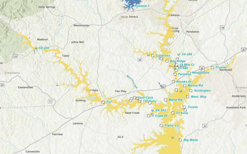 According to an Algal Bloom Monitoring map (left) from the South Carolina Department of Environmental Services, the entirety of Lake Hartwell is under an “HAB Watch” after a harmful algal bloom was confirmed in several locations on the South Carolina side of the lake. The square shapes on the map represent areas with “HAB reported sightings.” Right, HAB can appear like bright green spilled paint or blue-green discoloration of the water. (Photo courtesy of the South Carolina Department of Environment)