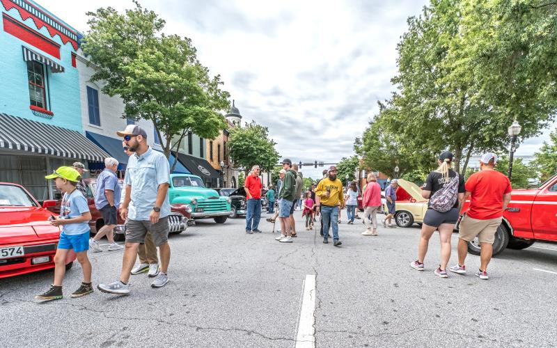 Photos by Scoggins and Bill Powell