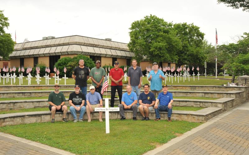 Members of American Legion Post 109 and Sons of the American Legion spent the morning of May 17 putting out crosses on the courthouse lawn to honor Hart County’s service men and women who made the ultimate sacrifice. The group will hold its annual Memorial Day ceremony Monday, May 26 at 11 a.m. in the courtroom inside the Hart County Courthouse. (Photo/Gus Cawley)