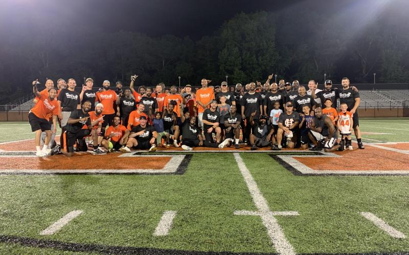 Pictured is all former Bulldogs as well as current and former coaches at the inaugural Harper Island Alumni Game.  (Photo/Benjamin London)