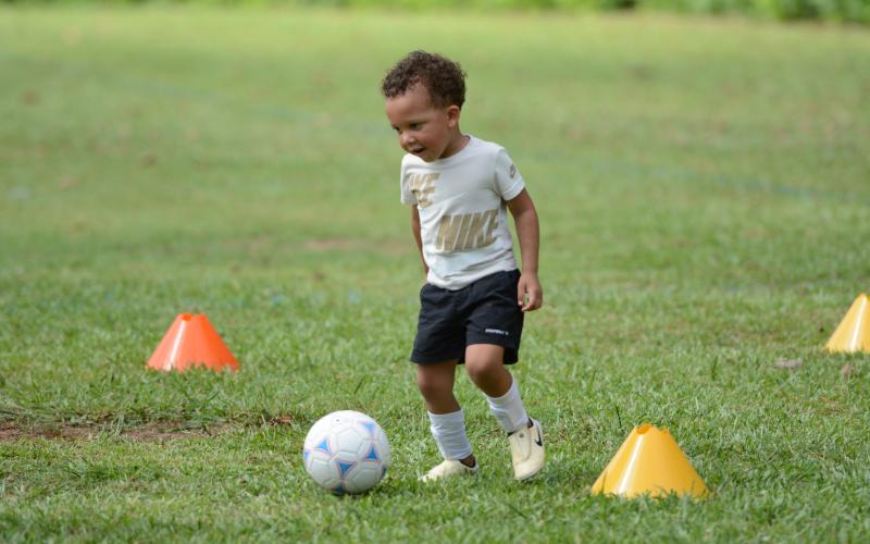 Campers at itty-bitties camp as they learn the game of soccer and grow a love for the game. (Photo/Benjamin London)
