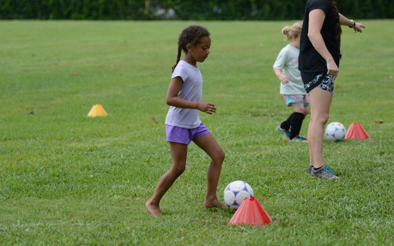 Campers at itty-bitties camp as they learn the game of soccer and grow a love for the game. (Photo/Benjamin London)