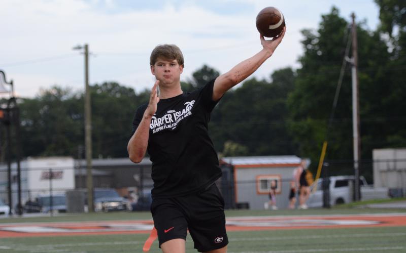 Tanner Ayers rears back to pass. (Photo/Benjamin London)