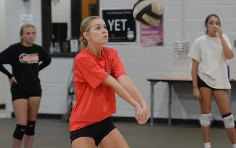 Rising sophomore Blair Allen works on passing during a summer practice. (Photo/Benjamin London)
