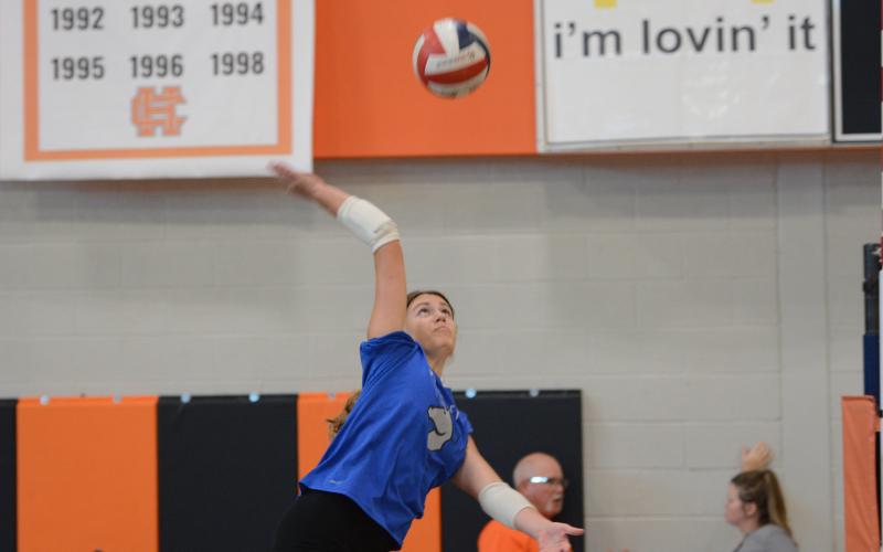 Rising sophomore right side hitter Coley Phillips goes for the kill during a summer practice. (Photo/Benjamin London)