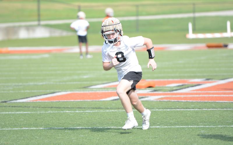Rising junior receiver Knox Pierce runs a route during a summer practice. (Photo/Benjamin London)