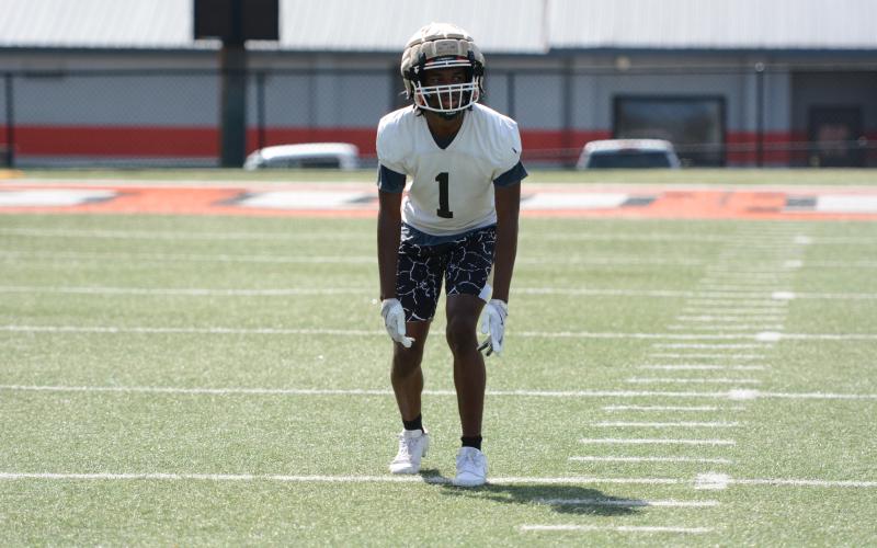 Rising senior safety Ramarcus Simpson awaits the snap during a practice in June. (Photo/Benjamin London)