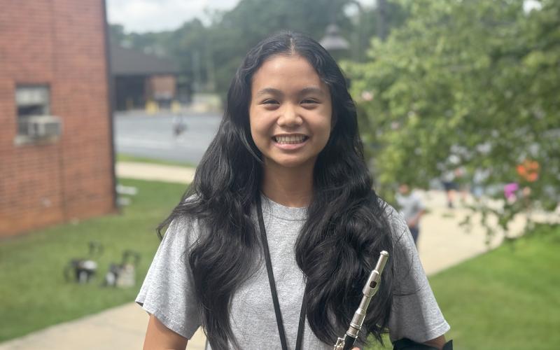 Uniform Manager Christina Tran poses with her piccolo after being named officer of the week for this week’s High Notes series. Leaders praised Tran for her attention to detail and patience with the band while she ensures all members are dressed in proper attire. (Photo by Adriana Cascio)