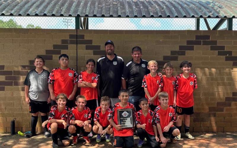 Pictured is the 12U Hart Academy soccer team after capturing the programs first ever tournament win Aug. 16 in Athens. (Photo submitted by Hart Academy)