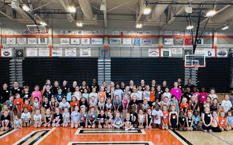 Pictured is nearly 80 campers alongside the current Hart County High School cheer squad at this years Little Bulldogs Cheer Camp Aug. 16. (Photo submitted by Hart County High School Cheer)