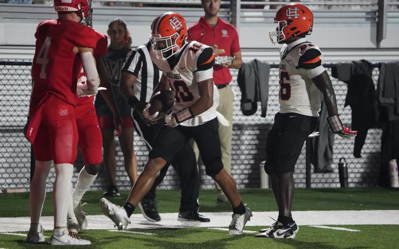 Junior wide receiver PJ Johnson celebrating after making a tremendous catch down the right sideline. (Photo by Ric Williams)