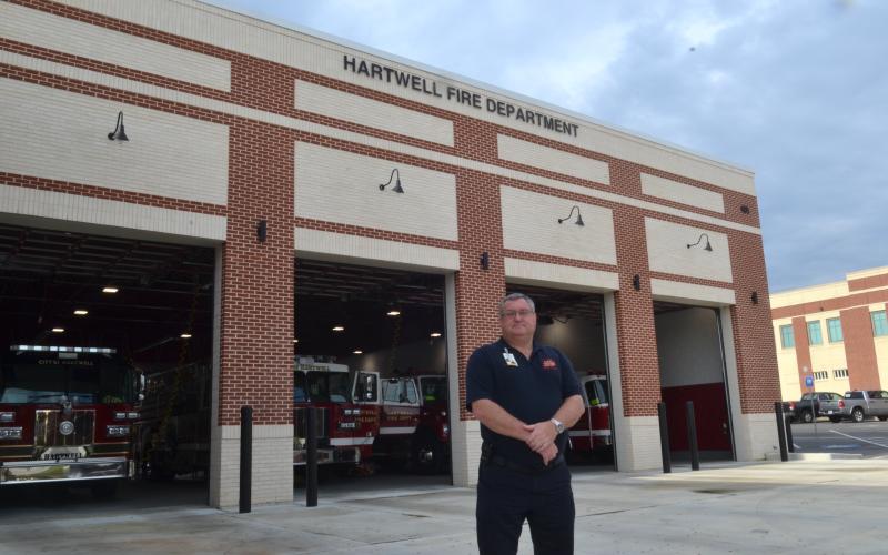 Fire Chief Alan Daniel poses in front of the Hartwell Fire Department, located at 456 E. Howell St., on Tuesday. Daniel is recognized this week as a hero of Hart County for his 41 years of service to the community. (Photo by Adriana Cascio)