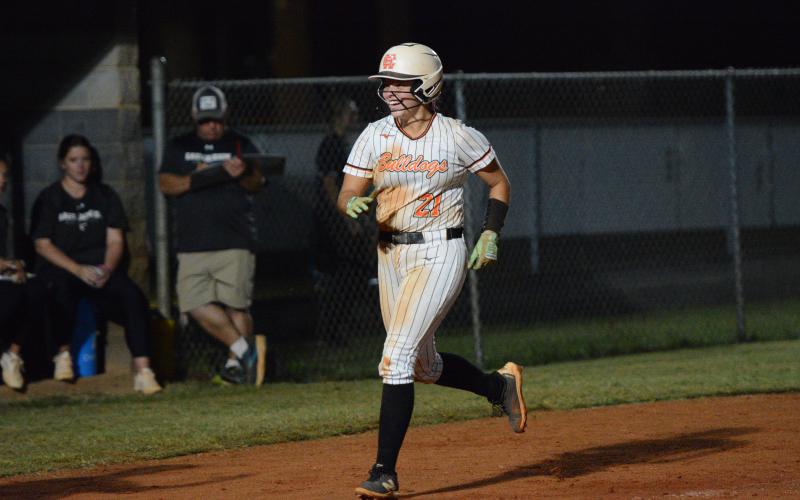 Junior pitcher Chesnee Strickland rounds the bases after a solo home run in the bottom of the second inning as the Lady Dogs pick up their second region win of the season with a 16-1 win over East Jackson Sept. 16. (Photo by Benjamin London)