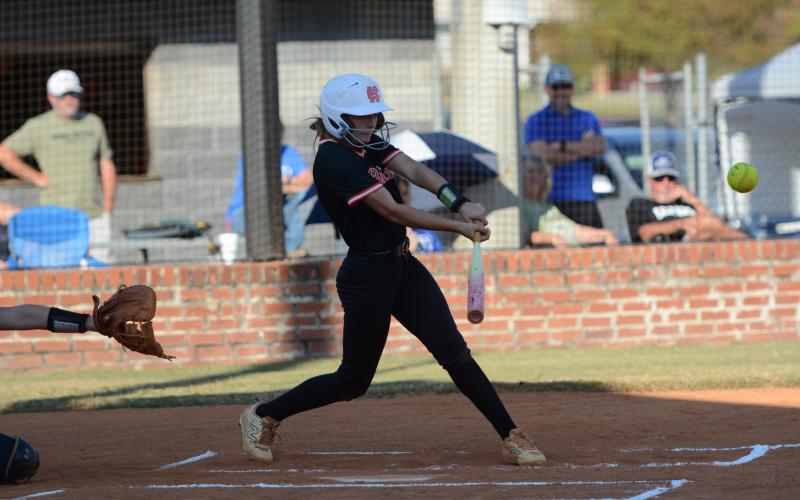 Freshman infielder and outfielder Chloie Lack collects a hit as she would go 3-4 at the plate and scored a run in the 4-1 win over the Lady Leopards of Banks County on senior night Sept. 22. (Photo by Benjamin London)