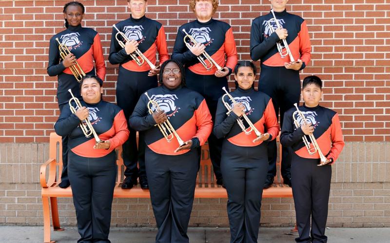 Trumpeters (front row, L-R) Susan Sanchez, Ja’Siah Geter, Jaqueline Cormona-Vargas and Matias Hernandez; and (back row, L-R) Jayla Christopher, Clayton Segers, Brody McDuffie and Tyson Tiffany were named the section of the week for the Sept. 25 High Notes series. Section leader Segers said he is proud of the trumpets, especially after their performance at the band’s Sept. 16 exhibition. (Photo submitted by Hilaree Hudson)