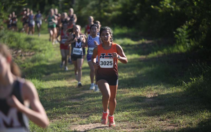 Pictured is senior Mareli Fajardo Bacilio as she placed 10th and 12th in the last two meets. (Photo by Bo Underwood)