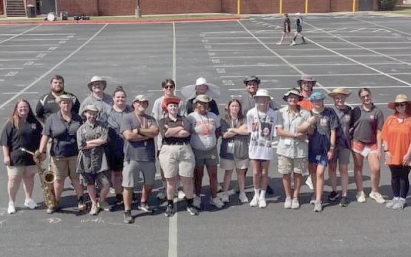 a group of Bulldog Marching Band students dressed like director Alan Tolbert on the last day of band camp in July to honor the long-term band director who is slated to retire in June after 27 years of directing the marching band. (Photo courtesy of the Hart County Bulldog Marching Band)