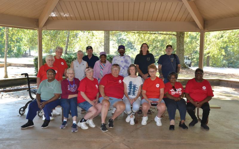 AARP Chapter #2006 members (front row, L-R) Ida Hartland, Mary Lewis, Sandy Mariacher, Deb Caudle, Nancy Sturm, Vonda Smith, Ophelia Craft and Milli Teasley; (back row, L-R) Claire Bramlette, Jan Doten, Bonnie Fracy, Rick Fracy, Alice Worthan, Al Burch, Steve Brown and Hand Sturm gather for the group’s annual picnic on Sept. 17. With 35 members, the chapter is the only AARP within the Northeast region, and it primarily serves the people of Hart and Franklin counties. (Photo by Adriana Cascio)
