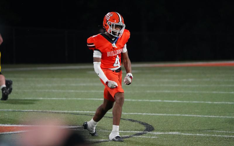 Senior safety Riyan Partlow celebrates after making a tackle for a loss in the 31-28 upset win over the top ranked Wolverines of Prince Avenue Christian Sept. 26. (Photo by Ric Williams)