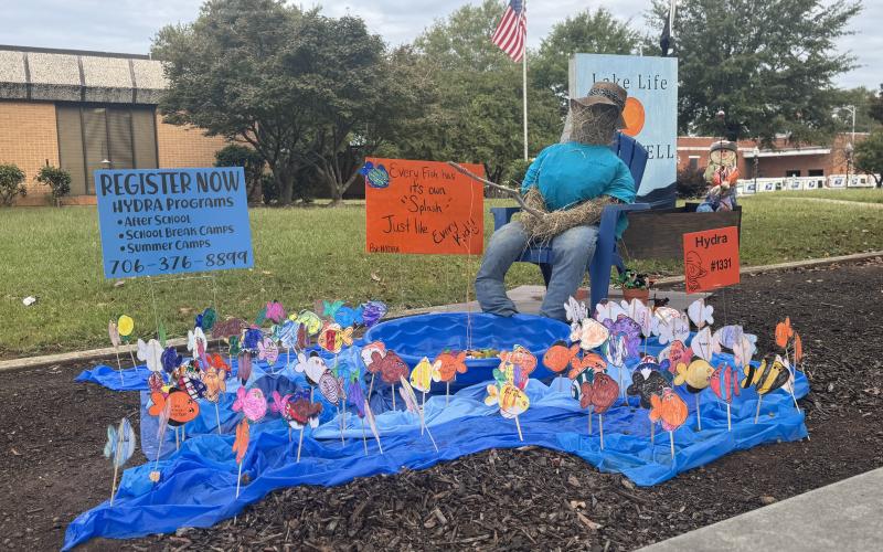 Scarecrows, like the one from HYDRA, have begun to pop up all over town. Voting for the People’s Choice Award is open through Oct. 29. Ballots can be found on page 2 of this week’s paper. (Photo by Adriana Cascio)