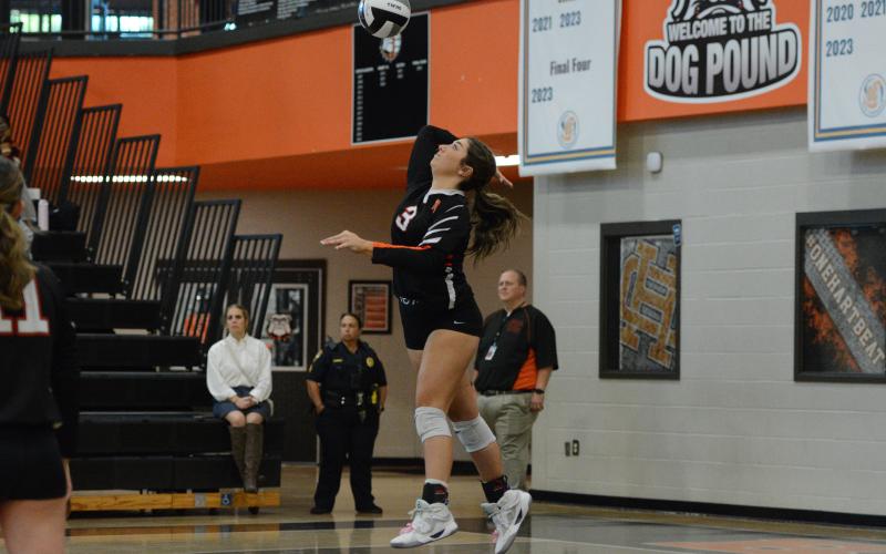 Junior setter Josee Fleming sets a school record for most points at the serve line, winning 25-0 in the third and final set to send the Volley Dogs back to the Sweet Sixteen after sweeping A.R. Johnson of Augusta Oct. 14. (Photo by Benjamin London)