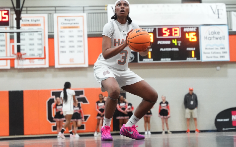 Senior forward Kiasia Montgomery makes crucial free throws late in the game to help seal a double-overtime win against the Lady Wildcats of Woodmont, 59-53, in the North Georgia Report Lake Hartwell Border Battle Jan. 10. Photo by Ric Williams.