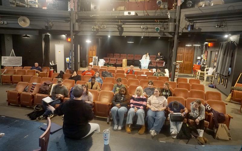 Director Lani Sessoms speaks to a crowd of actors and actresses before the beginning of a rehearsal for "The Diary of Anne Frank." The show, which opens Feb. 27, is just one the theatre works to bring to life for the community. Photo by Madison Linton.