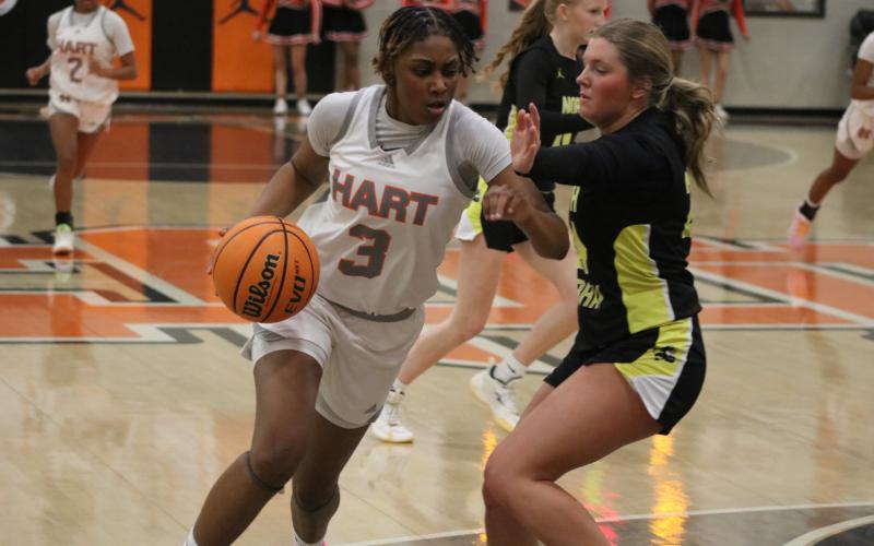 Photo by Grayson Williams Senior forward Kiasia Montgomery drives inside the paint, as she scored 23 points in the 60-39 win over the Lady Mountaineers of North Murray in the first round of the state playoffs Feb. 24. Photo by Grayson Williams.