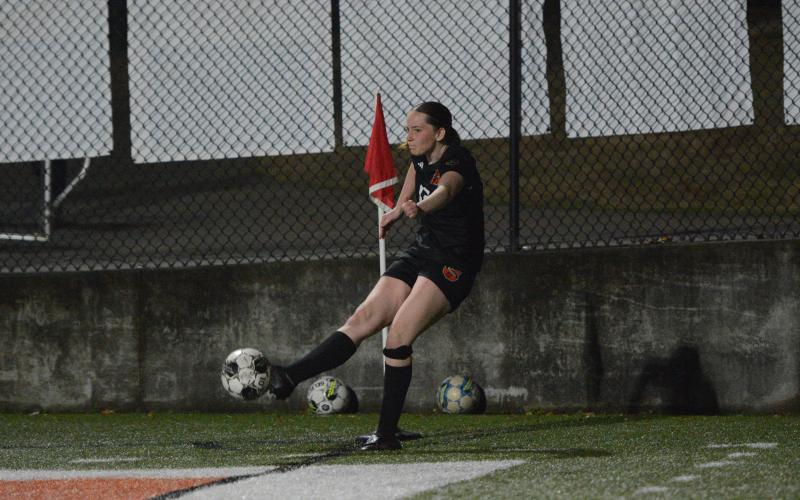 Photo by Benjamin London Madison Heaton sends a corner kick into play, as Hart captured a 5-0 win on the road against the Lady Patriots of Oglethorpe County Feb. 10. Photo by Benjamin London.