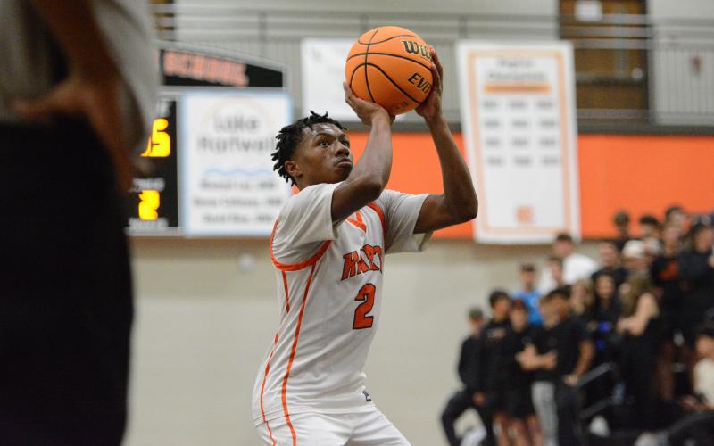 Senior guard Zaylen Shealer heads to the line for free throws for a game earlier in the season, as he had 16 points against Hebron and 14 points against Prince Avenue. Photo by Benjamin London.
