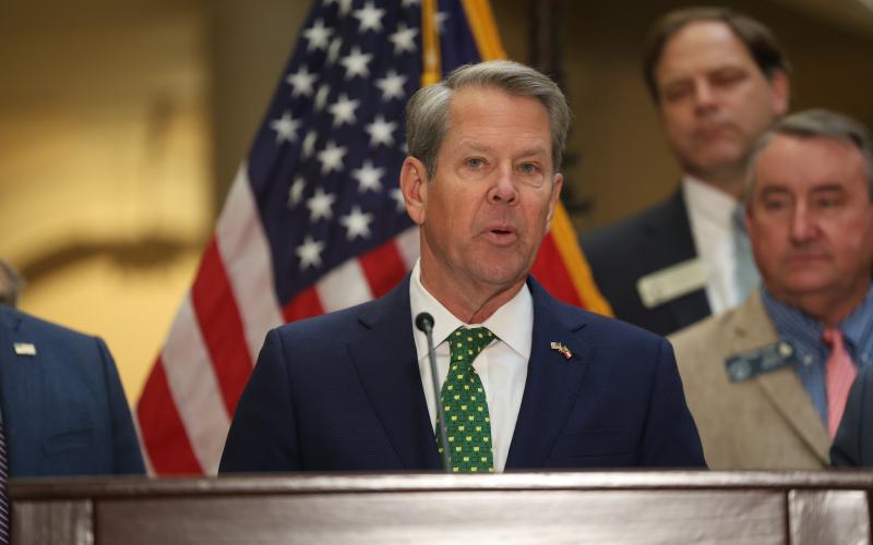 Gov. Brian Kemp speaks before signing Georgia House Bills 1199 and 1000 into law at the Georgia State Capitol March 20. The laws suspend the state motor fuel tax for 60 days and implement one-time income tax rebates. Photo by Ashtin Barker, Capitol Beat