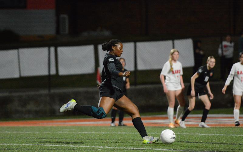Centerback Aidyn Craft scores off a free kick in the 6-2 win over the Lady Wildcats of Rabun County Feb. 27. Photo by Benjamin London.
