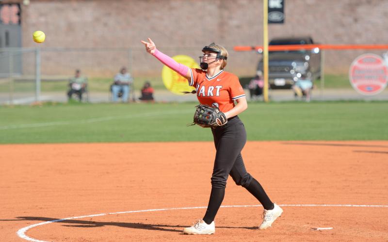 Pitcher Carly Dutton delivers the pitch in the 10-3 loss to the Lady Lions of  Franklin County March 11.  Photo by Benjamin London.