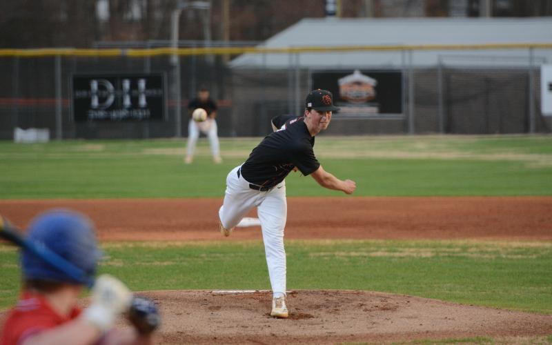 Junior pitcher Max Martin pitches three innings allowing eight hits, five earned runs, issued two walks and struck out four in the 8-6 loss to the Tigers of Crescent March 13. Photo by Benjamin London.