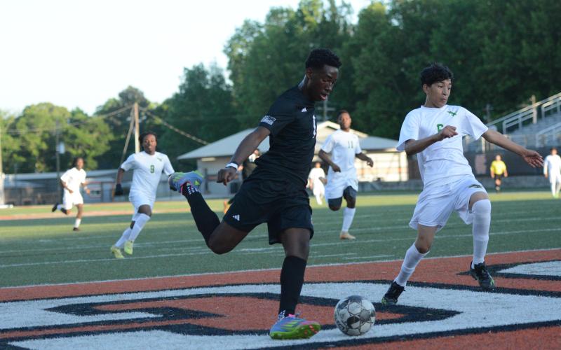 Cayson Craft scores his fourth goal out of the five goals he scored in the 10-1 win over the Eagles of Josey April 16.  Photo by Benjamin London.
