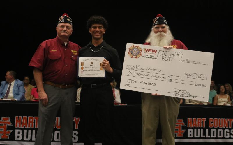 Kamron Montgomery (center) was awarded the VFW Post 8076 citation and medal, along with a VFW/One Hart Beat Foundation scholarship for JRTOC by VFW members during the senior awards night at Hart County High School April 29. Photo courtesy of the Hart County Charter System.