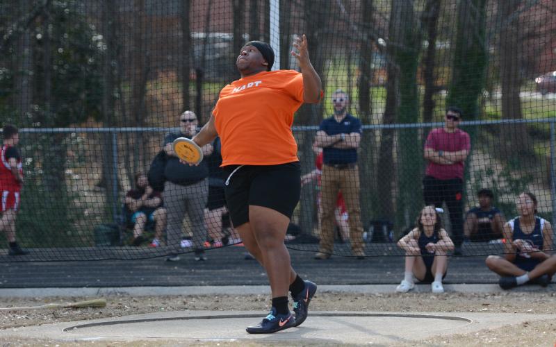 Senior Nicholas Carter competing in discus earlier this season, as he placed sixth in discus at Sectionals May 2 to advance to the State Meet May 14.  Photo by Benjamin London.