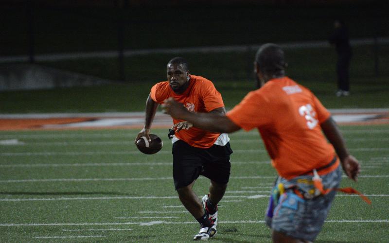 75 former players returned back to Herndon Stadium to compete in the second annual Harper Island Training Alumni Flag Football Game June 19. Photo by Benjamin London.