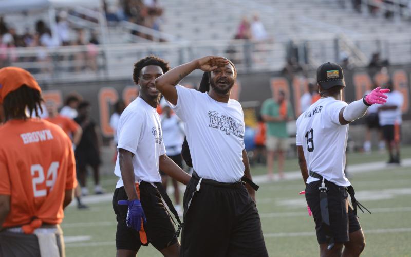 75 former players returned back to Herndon Stadium to compete in the second annual Harper Island Training Alumni Flag Football Game June 19. Photo by Benjamin London.
