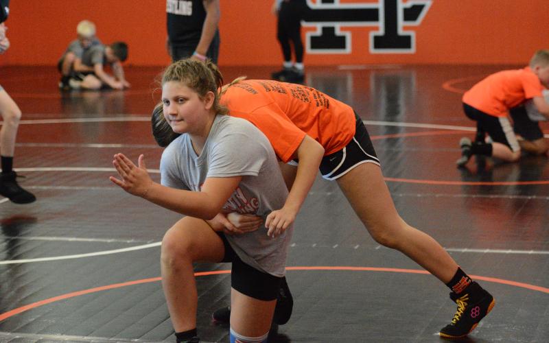 On July 17, the Hart County High School wrestling team held their inaugural Youth Wrestling Camp in their brand new mat room. Campers learned the basics of wrestling as well as advanced techniques that were taught by former and current wrestlers and coaches at Hart County. Photo by Benjamin London.