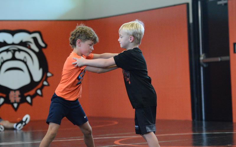 On July 17, the Hart County High School wrestling team held their inaugural Youth Wrestling Camp in their brand new mat room. Campers learned the basics of wrestling as well as advanced techniques that were taught by former and current wrestlers and coaches at Hart County. Photo by Benjamin London.