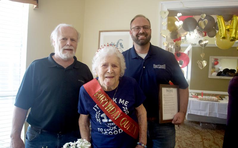 Photo by Madison Linton Hart County's oldest resident, Doris Mahannah (front) was honored with proclamations by Hart County Board of Commissioners Chairman Marshall Sayer (left) and City of Hartwell Mayor Brandon Johnson (right) during her birthday celebration at Brookdale on her 110th birthday June 24.