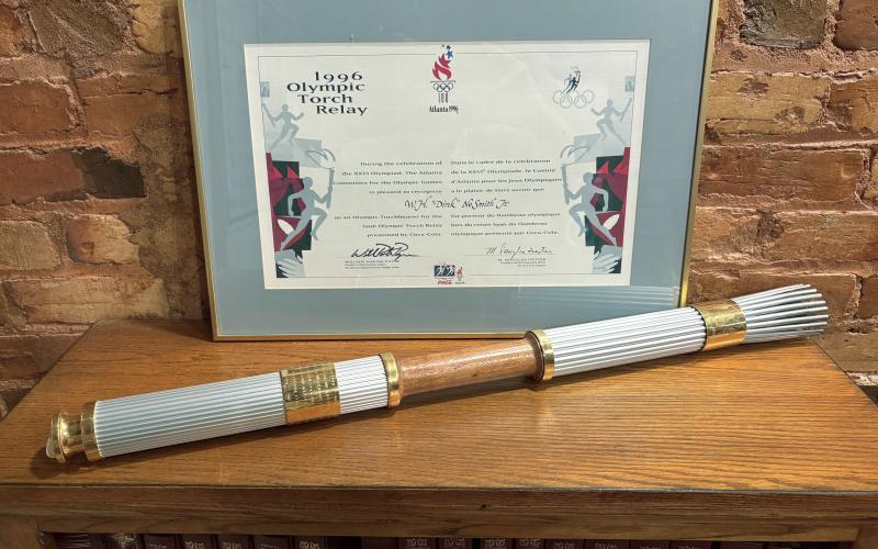 Atop an oak bookcase in my office sits the Olympic torch that I carried in 1996. Photo submitted by Dink NeSmith.