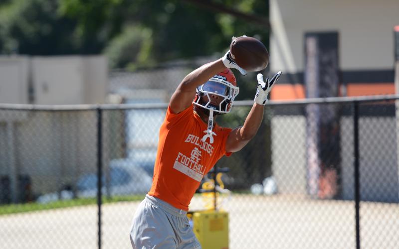 Senior wide receiver PJ Johnson makes the catch during a practice on July 16. Photo by Benjamin London.