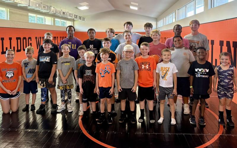 Pictured is the morning group of campers ages five to 12-years-old, along with former and current wrestlers who participated in the basics to wrestling camp July 17.  Photo submitted by Hart County Wrestling.