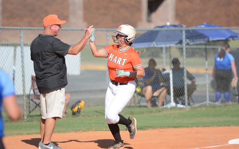 Senior infielder and pitcher Chesnee Strickland rounds the bases after a three-run blast to deep center in the 15-3 run-rule win over Barrow Arts and Sciences Academy Aug. 25. Photo by Benjamin London.