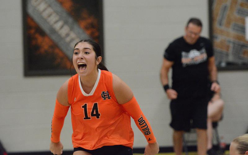 Setter Josee Fleming celebrates after Hart completed the comeback to knock off Madison County in three sets, 18-25, 25-16 and 15-10 Aug. 11. Photo by Benjamin London.
