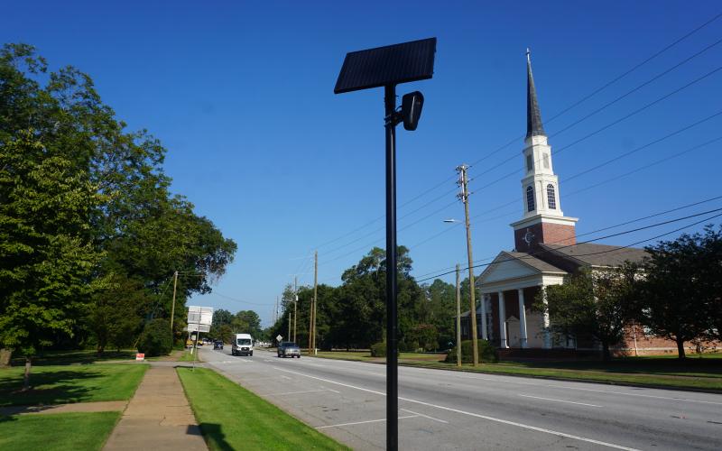 A flock camera in the City of Hartwell. State lawmakers are working to curb misuse of the cameras after several arrests statewide.  Photo by Madison Linton.